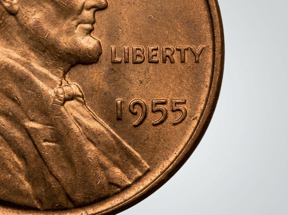 Macro photo of 1955 doubled die obverse penny showing doubling on the date and LIBERTY